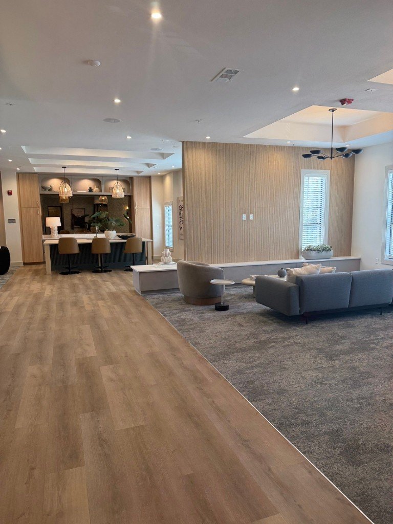 Wide-plank wood-look flooring in an open living space