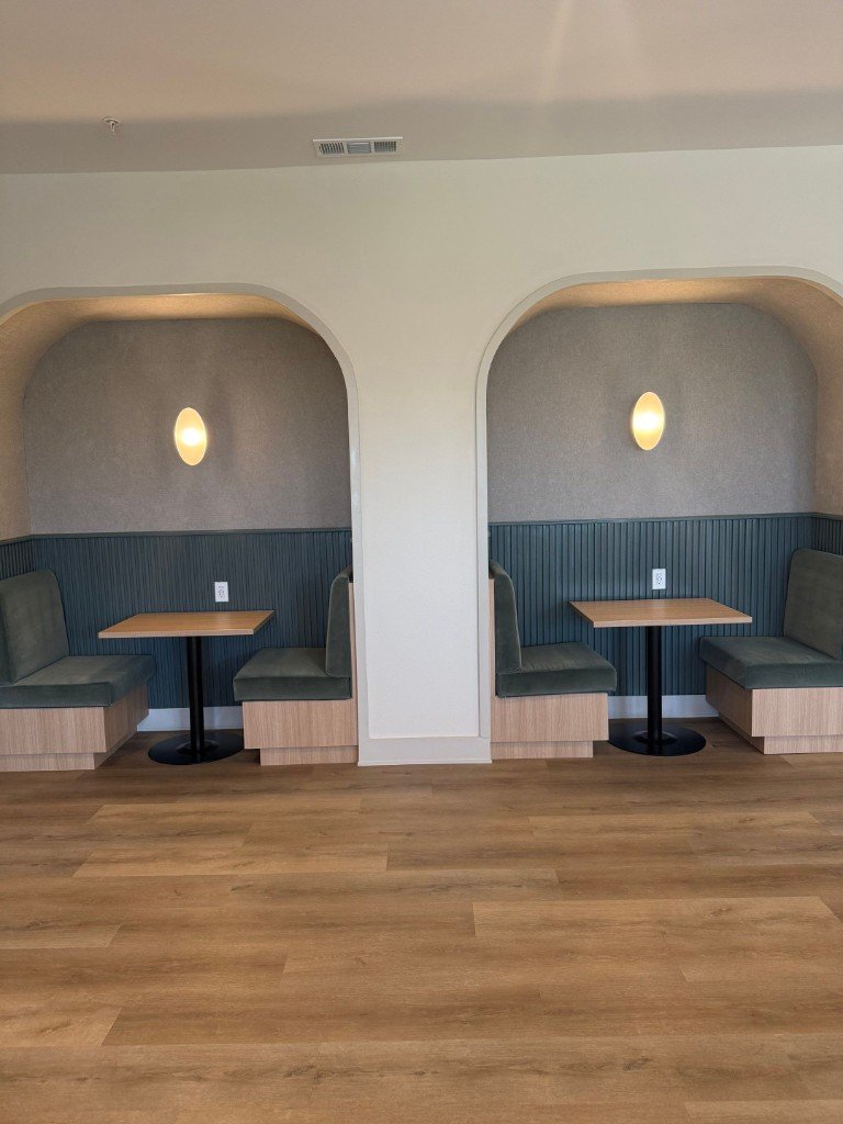 Fresh interior paint with finished accent wall and built-in seating